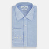 View 5 of product The Turnbull & Asser Pale Blue Linen Mayfair Shirt features a collar, front pocket, and white buttons. This long-sleeve shirt is displayed on a white background.