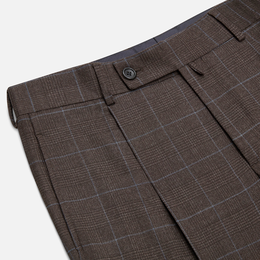 The Turnbull & Asser Brown Check Arthur Trousers feature a straight leg, button and zip closure, belt loops, and front pleats, shown against a plain white background.