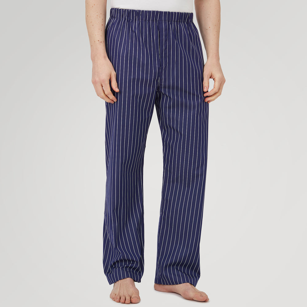 Turnbull & Asser Navy Stripe Modern Pyjama Trousers in superfine cotton with white stripes, elastic waistband, and relaxed fit, presented against a plain white background.