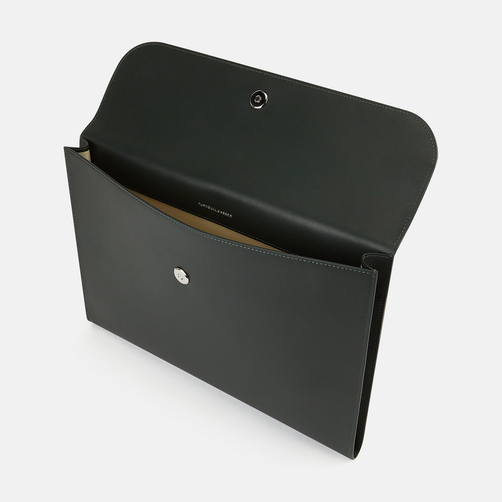 A stylish, forest green leather snap-fasten pouch by Turnbull & Asser is pictured against a plain white background.