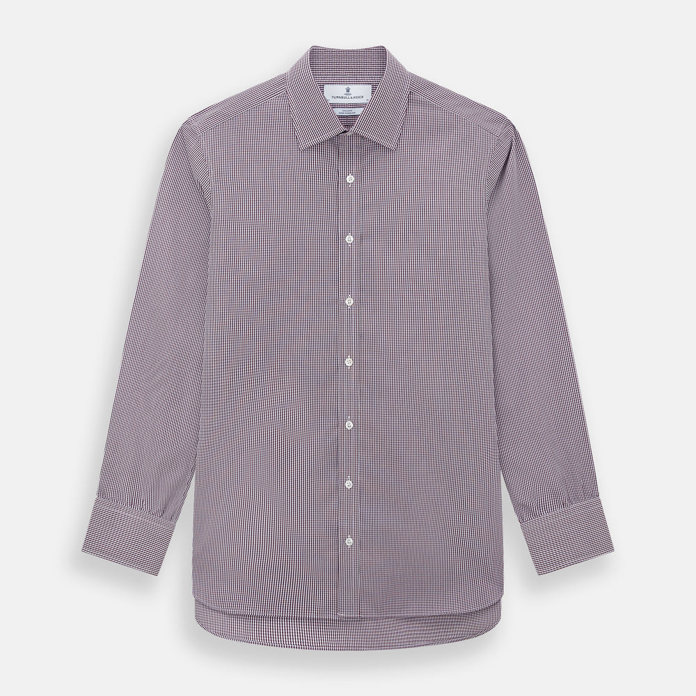 The Turnbull & Asser Burgundy Micro Check Mayfair Shirt features long sleeves, a pointed collar, and white buttons—perfect for formal wear. Shown laid flat on a white background.