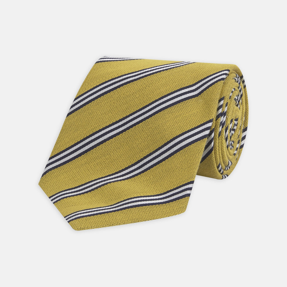 The Turnbull & Asser GGT92000 3042 11 OS is a classic yellow necktie with diagonal black and white stripes, rolled elegantly on a white background.