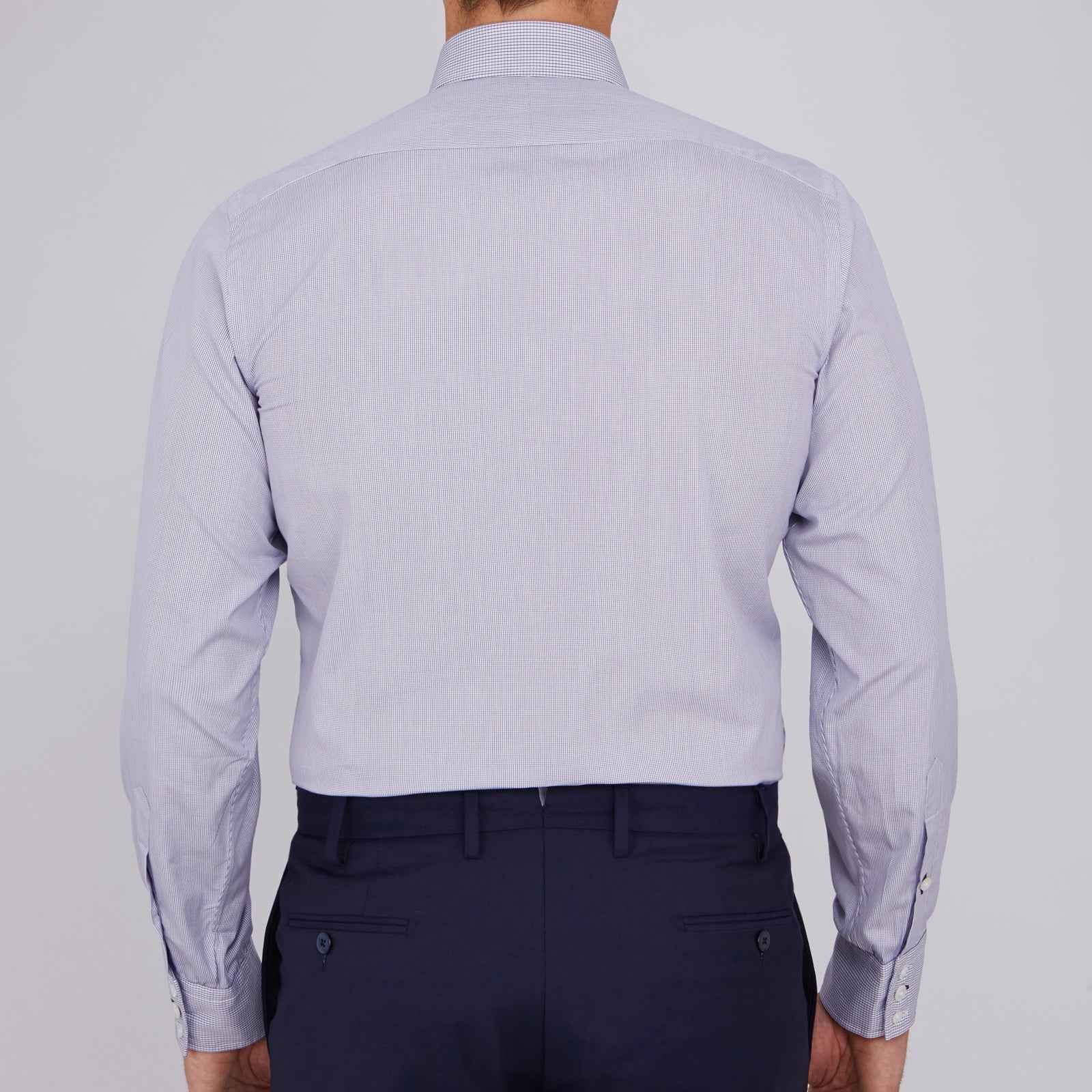 View 3 of product The Turnbull & Asser Slim Fit Blue Checked Shirt features long sleeves, contrasting white buttons, a regent collar, and distinct blue check pattern detailing on the cuff.