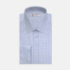 View 2 of product Close-up of Turnbull & Asser's Navy Group Check Cotton Fabric, featuring a light blue base with intersecting navy and light blue lines in a plaid pattern, displayed in a circular frame on a white background.