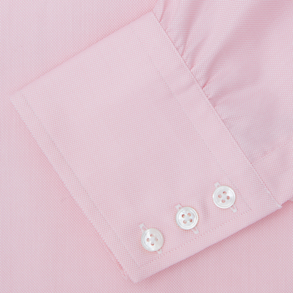 The Turnbull & Asser Pink Royal Oxford Cotton Shirt features a button-down collar and 3-button cuffs, ideal for men's weekend wear. Displayed against a plain white background.