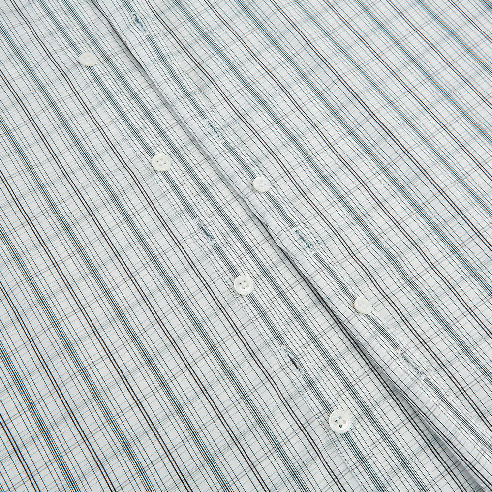 The Turnbull & Asser Forest Green Multi Check Westminster Shirt is a tailored, long-sleeved, button-up shirt with a collar and a white base featuring light blue and green plaid, displayed flat on a white background.