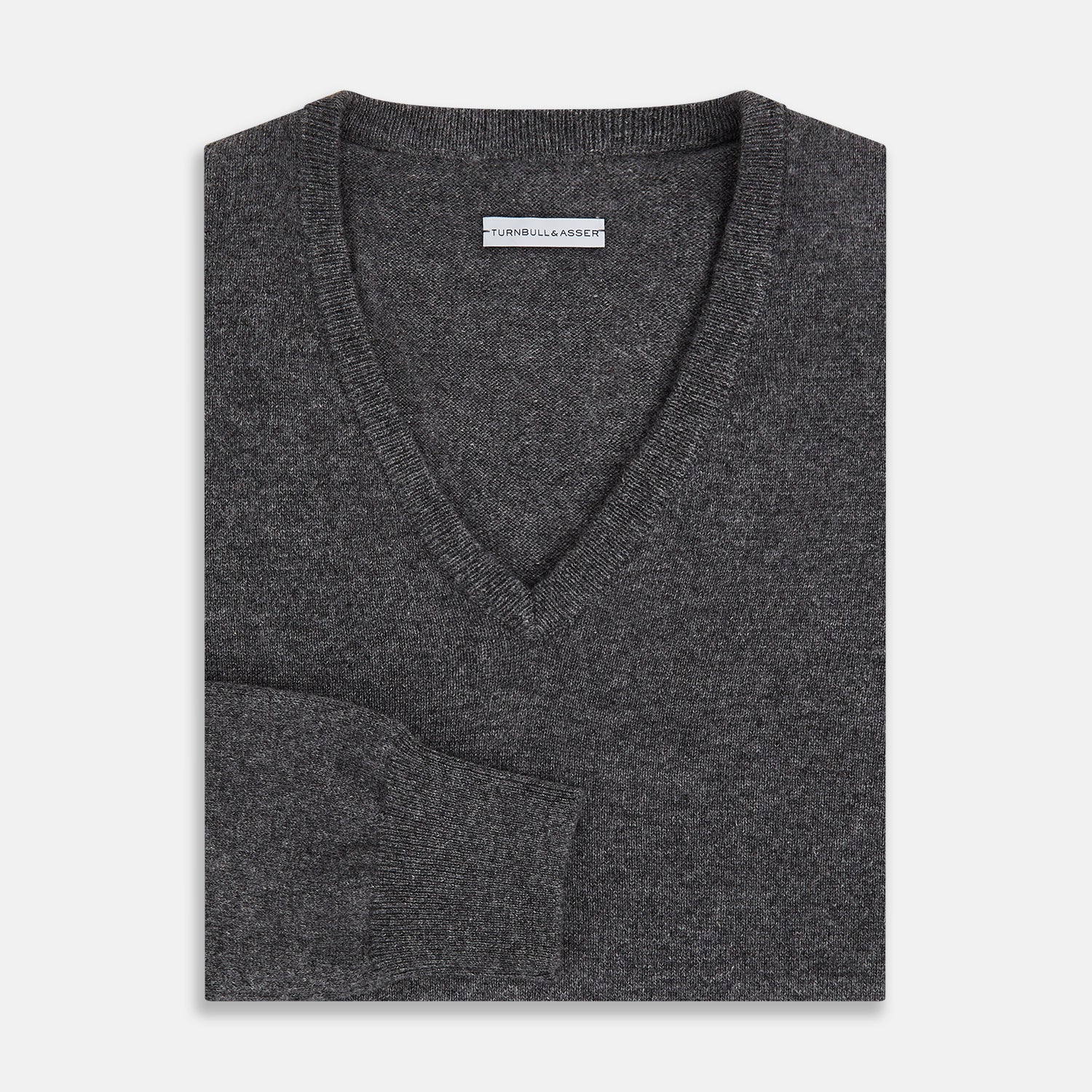 View 4 of product The Charcoal Grey Cashmere V-neck Jumper by Turnbull & Asser features ribbed cuffs, hem, and neckline—an essential knitwear piece, shown on a white background.