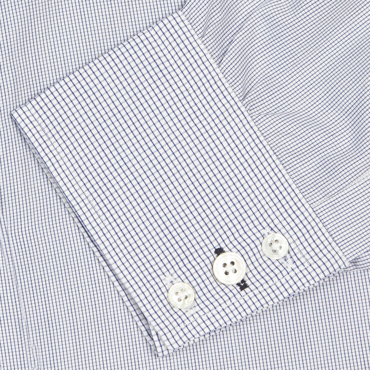 View 6 of product The Turnbull & Asser Slim Fit Blue Checked Shirt features long sleeves, contrasting white buttons, a regent collar, and distinct blue check pattern detailing on the cuff.