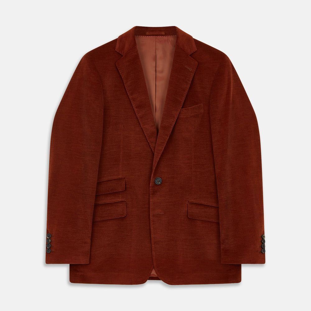 The Rust Cord Barrington Blazer by Turnbull & Asser is tailored in Italy with notch lapels, two front buttons, three pockets, and four-button cuffs, shown flat on a white background.