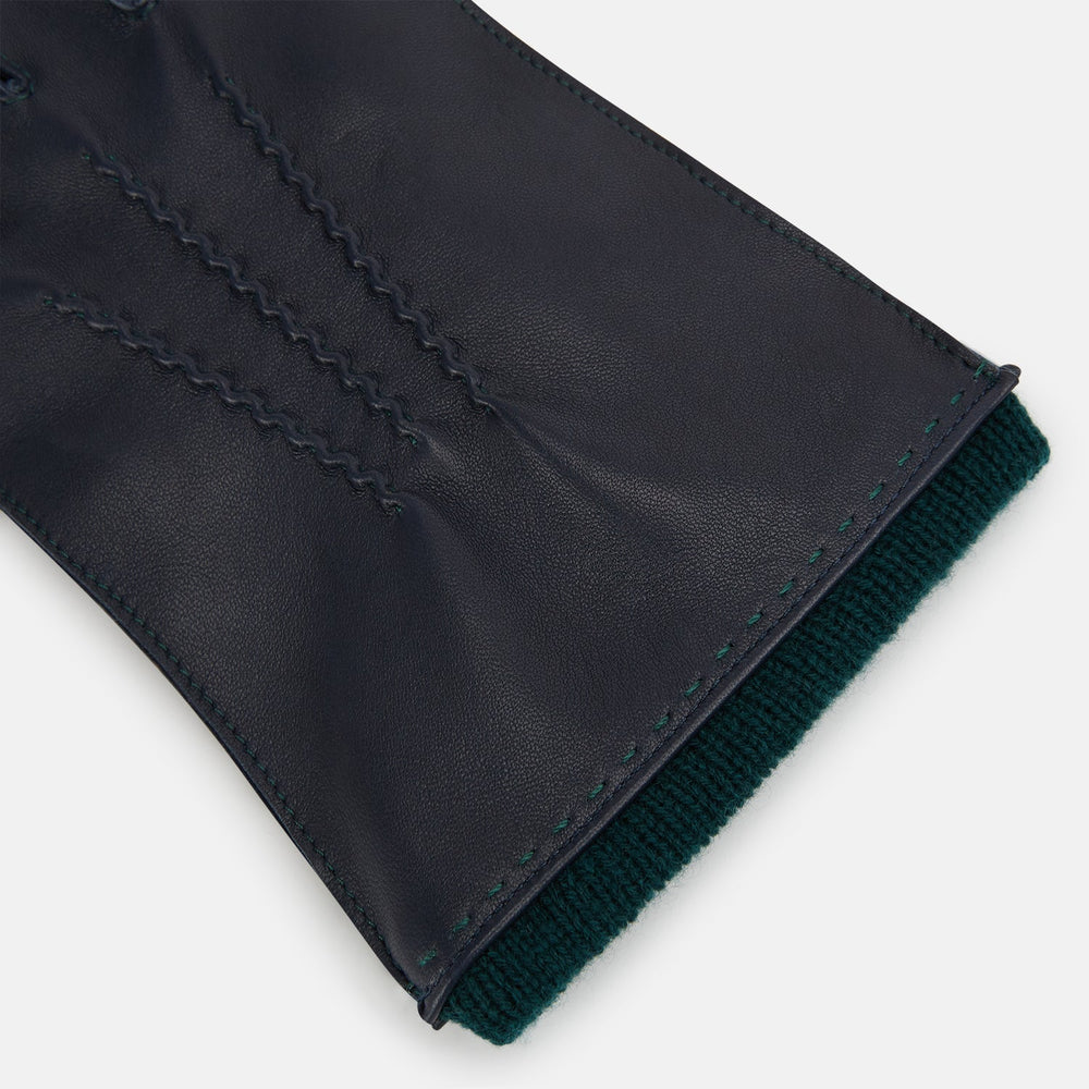 A pair of Turnbull & Asser Navy/Forest Green Cashmere-Lined Hairsheep Leather Gloves are shown flat, one palm up and one palm down, against a plain white background.