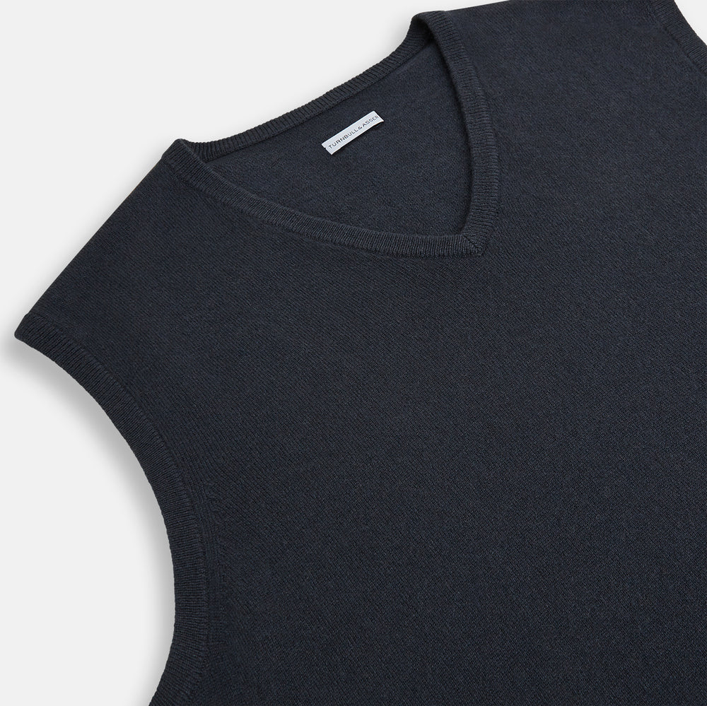 The Turnbull & Asser Dark Green Melange Cashmere V-Neck Vest features a sleeveless design and ribbed hem, offering a refined look, showcased on a plain white background.