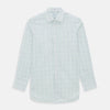View 1 of product The Turnbull & Asser Dark Green Grid Check Mayfair Shirt features a white base with blue and dark green checks, a classic T&A collar, buttoned cuffs, and a Mayfair fit. The long-sleeve shirt is shown laid flat on a white background.