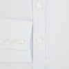 View 5 of product The Turnbull & Asser Blue and White Micro Check Mayfair Shirt features a pointed collar and white buttons, shown flat against a white background.