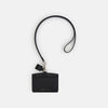 View 1 of product The Turnbull & Asser Navy ID Card Holder is shown with a matching lanyard strap and key cover, all featuring silver hardware, against a plain white background.
