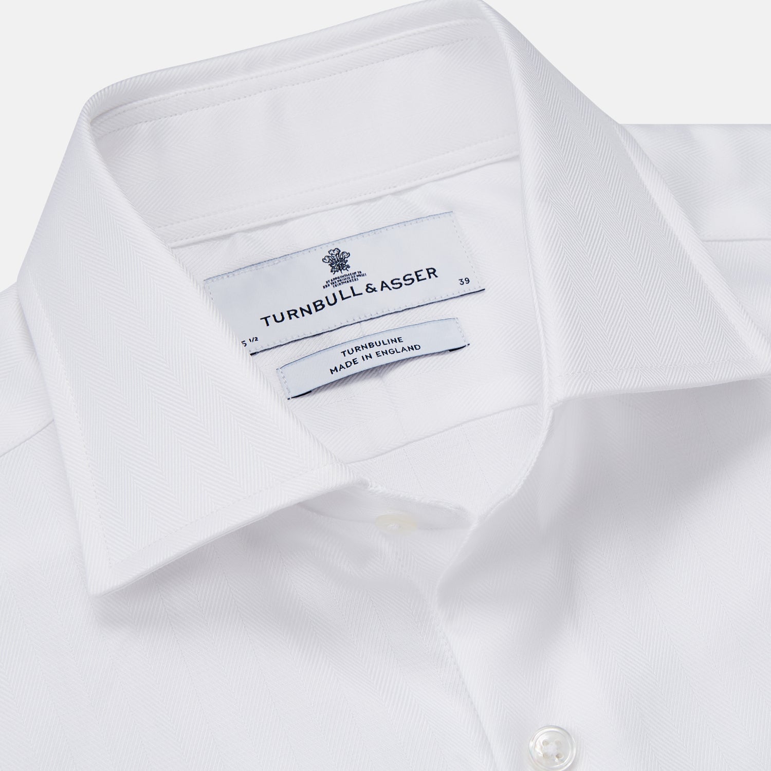 View 2 of product The Turnbull & Asser White Herringbone Tailored Fit Shirt with a Kent collar is displayed against a white background.