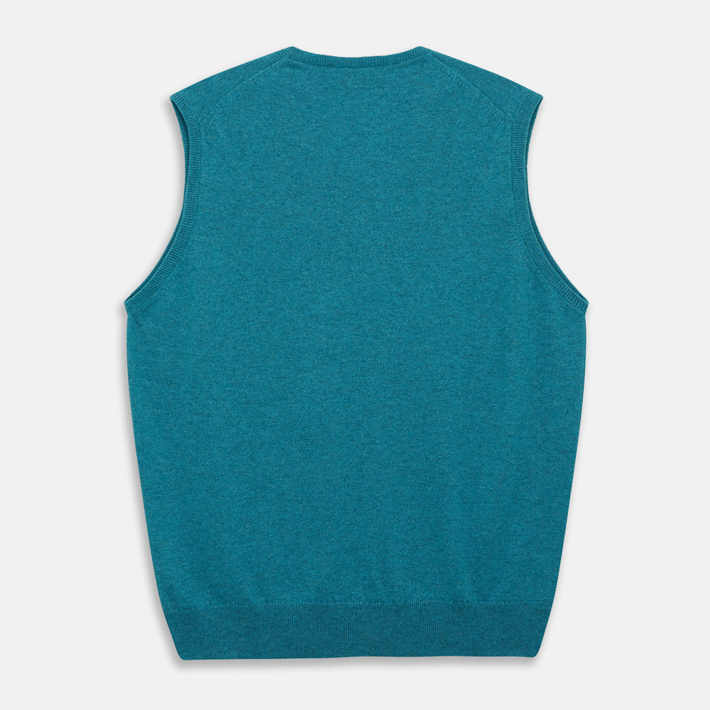 The Teal Ifor Slipover by Turnbull & Asser is a sleeveless, V-neck knit made in Scotland from lightweight cashmere, shown in teal blue against a white background.