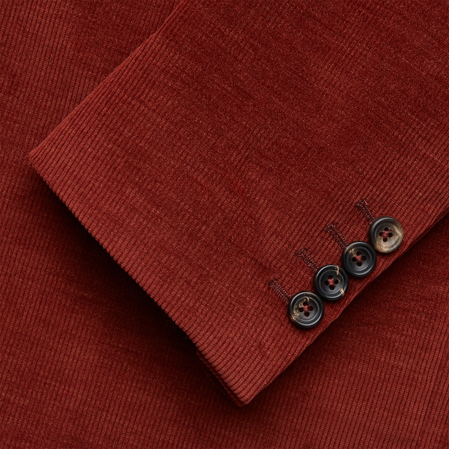 View 4 of product The Rust Cord Barrington Blazer by Turnbull & Asser is tailored in Italy with notch lapels, two front buttons, three pockets, and four-button cuffs, shown flat on a white background.