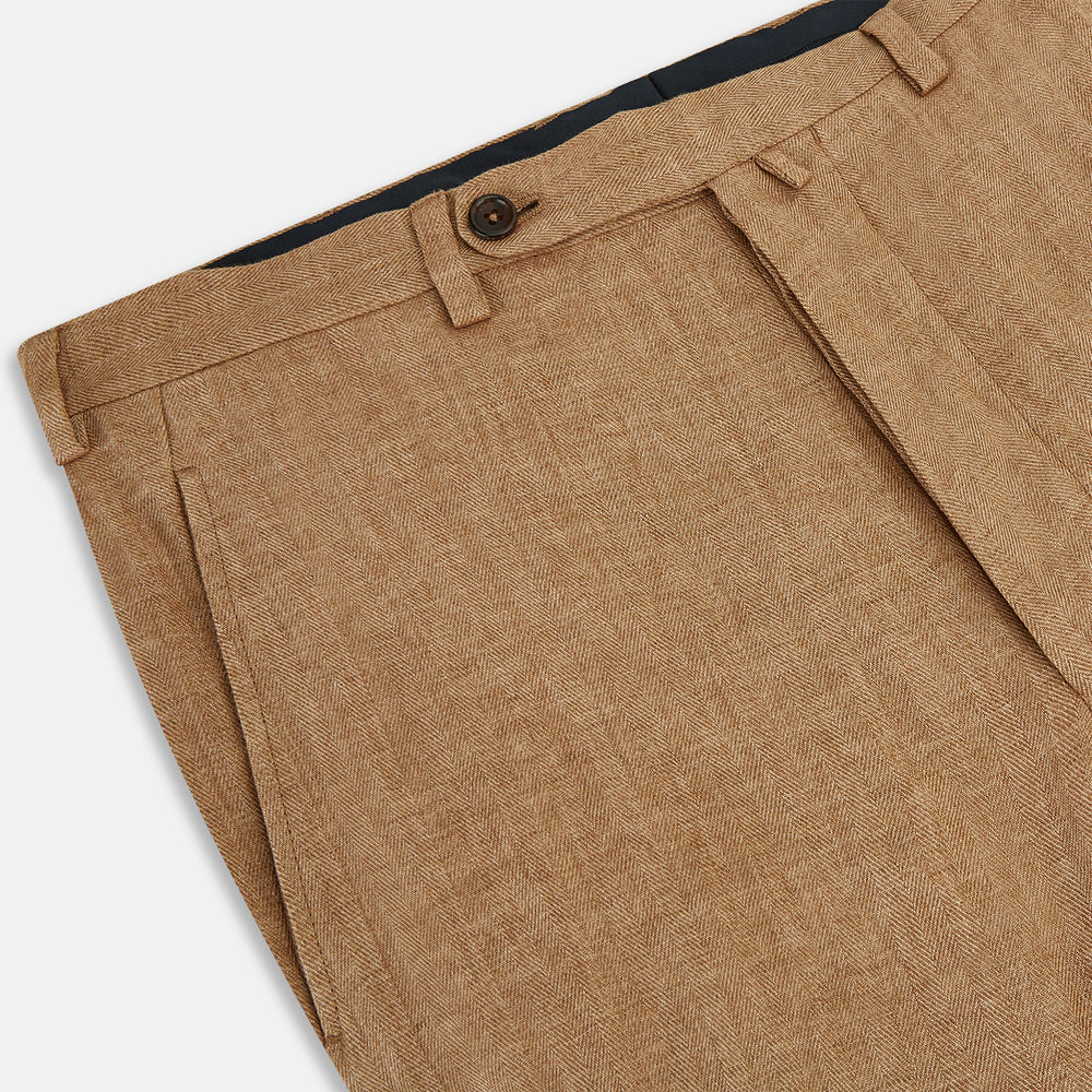 The Turnbull & Asser Camel Striped Linen Edmund trousers feature a straight-leg fit, button and zipper closure, belt loops, and pockets, crafted from lightweight summer fabric and shown against a white background.