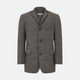 The Fulham Shadow Grey Single-Breasted Quilted Blazer by Turnbull & Asser features a checkered pattern, notched lapel, three front buttons, chest pocket, and two flap pockets—ideal for formal wear on a plain white background.