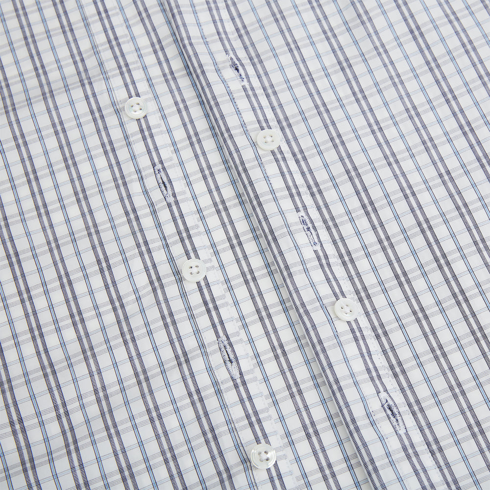 The Turnbull & Asser Navy and Blue Multi Tattersall Westminster Shirt features long sleeves, a button-down style, and a Turnbull collar in a blue and gray check pattern on white, laid flat against a white background.