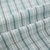 View 8 of product The Turnbull & Asser Forest Green Multi Check Westminster Shirt is a tailored, long-sleeved, button-up shirt with a collar and a white base featuring light blue and green plaid, displayed flat on a white background.