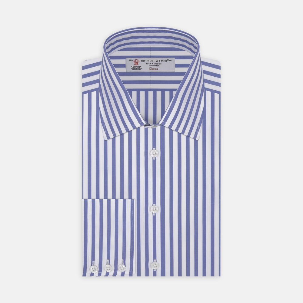 Close-up of Turnbull & Asser's Mid Blue Candy Stripe Cotton Fabric, featuring evenly spaced vertical blue stripes on white, displayed in a circular frame against a light gray background.