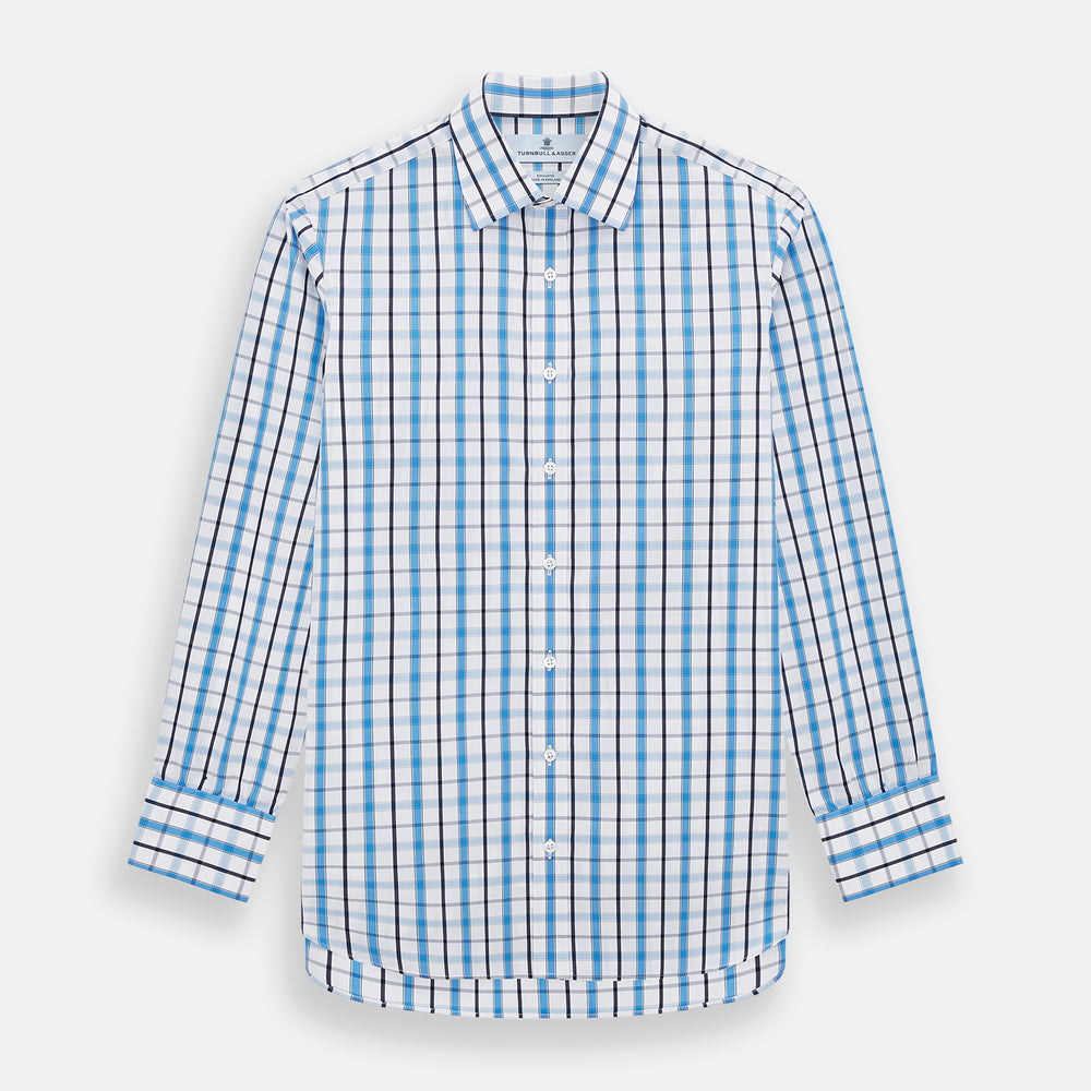 The Turnbull & Asser Blue and Navy Combination Check Mayfair Shirt features a classic button-up style with long sleeves, T&A collar, and a blue, navy, and white check pattern, shown against a plain white background.