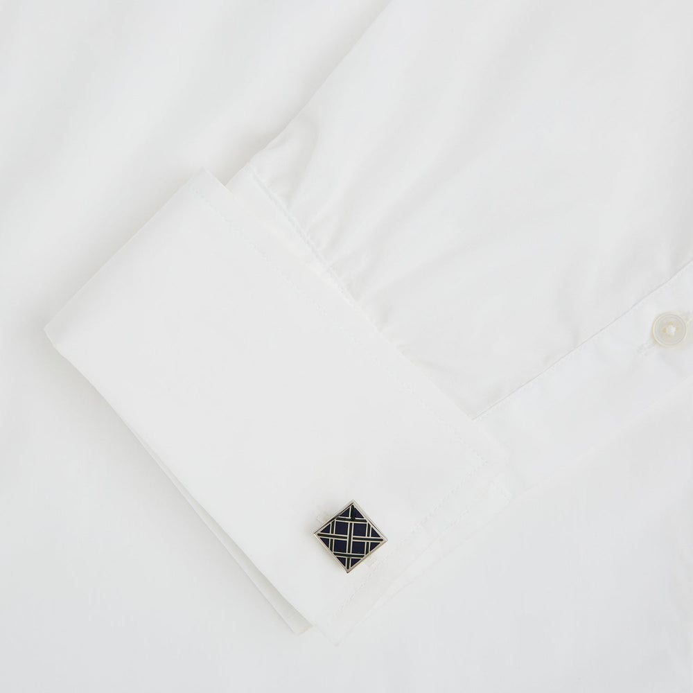 The Blue Grid Square Cufflinks by Turnbull & Asser feature a geometric square sterling silver design with intersecting navy, black, and white lines, showcased on a white background.