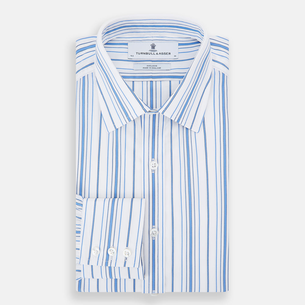 The Turnbull & Asser Blue Multi Stripe Mayfair Shirt features a T&A collar, vertical blue and white stripes, long sleeves, and a crisp Mayfair fit for a refined look.