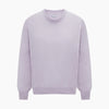 View 5 of product The Turnbull & Asser Lilac Cashmere Round Neck Jumper for men features long sleeves with ribbed cuffs and hem, offering a stylish, refined look. Shown against a white background.