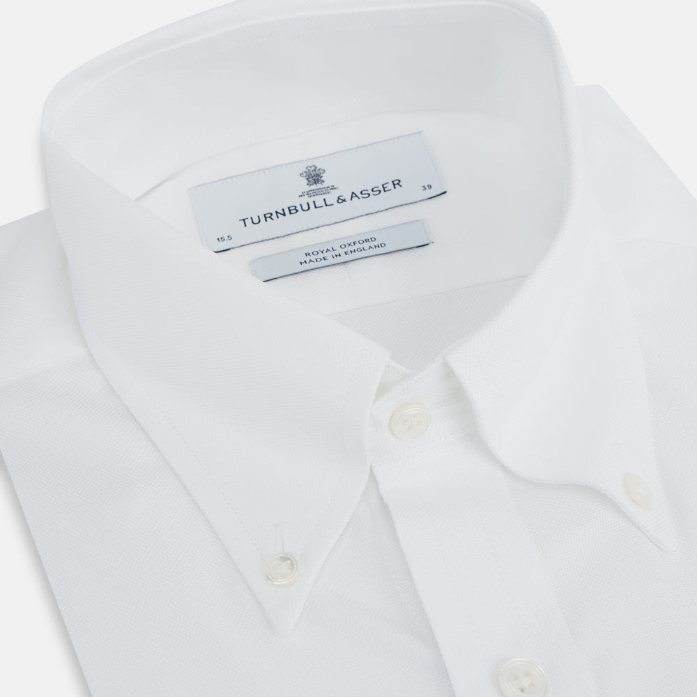 The Turnbull & Asser White Royal Oxford Cotton Shirt features a button-down collar and 3-button cuffs, ideal for minimalist looks, displayed on a white background.