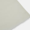 View 2 of product The Turnbull & Asser White Hand-Dyed Cashmere Scarf is sheer, lightweight, and shown hanging with a loose knot against a plain white background.