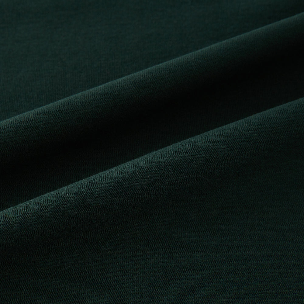 A forest green long-sleeve crewneck t-shirt by Turnbull & Asser is laid flat on a white background, showing the front side with no visible patterns or logos—a timeless, versatile staple.