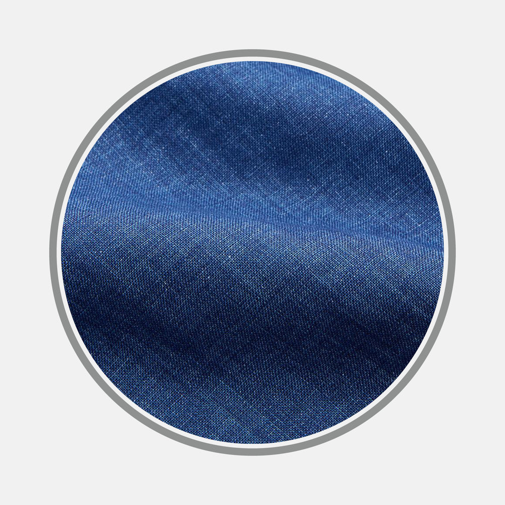 Close-up of Turnbull & Asser Navy Linen Fabric, highlighting its texture and weave pattern, displayed within a circular border against a plain white background.