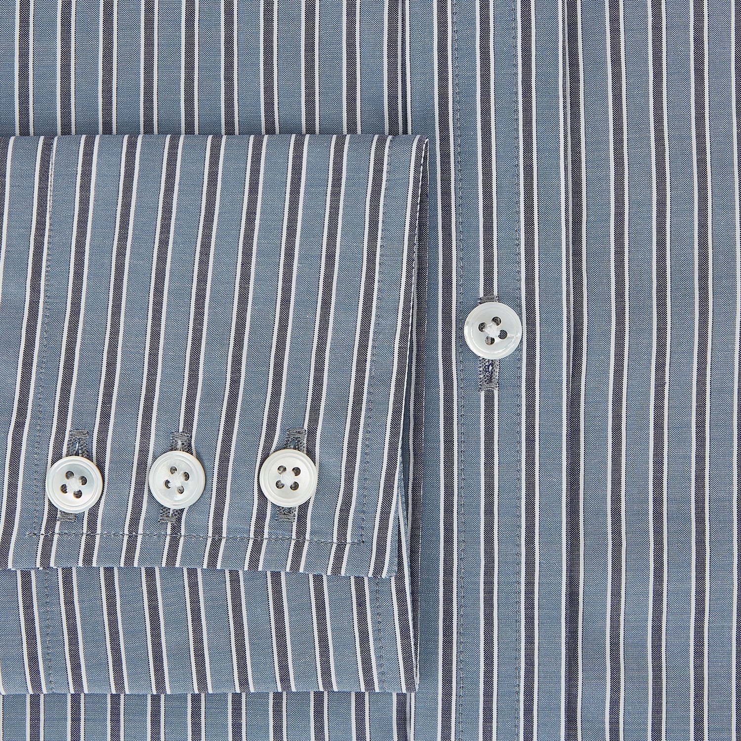 View 4 of product The Steel Grey Ticking Stripe Mayfair Shirt by Turnbull & Asser is a long-sleeved, button-up shirt with a collar, crafted from fine Italian cotton and featuring slim steel grey and white stripes with white buttons for a classic touch.