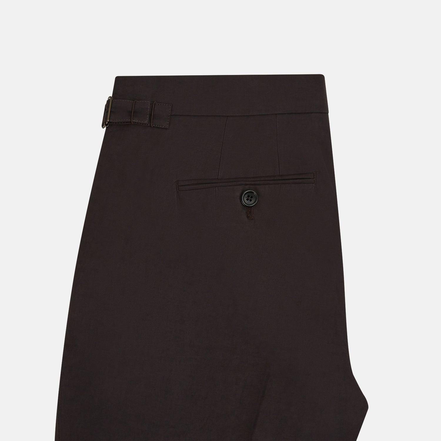 View 5 of product A pair of brown linen Henry trousers by Turnbull & Asser with a straight-leg cut and button waistband, ideal for formalwear, displayed against a plain white background.