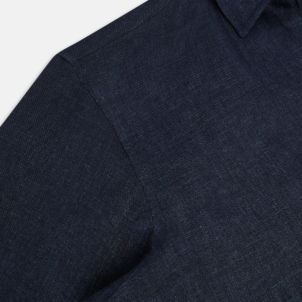The Navy Linen Windsor Shirt by Turnbull & Asser features long sleeves, white buttons, a Turnbull collar, and buttoned cuffs in dark navy blue linen. Shown laid flat on a white background.