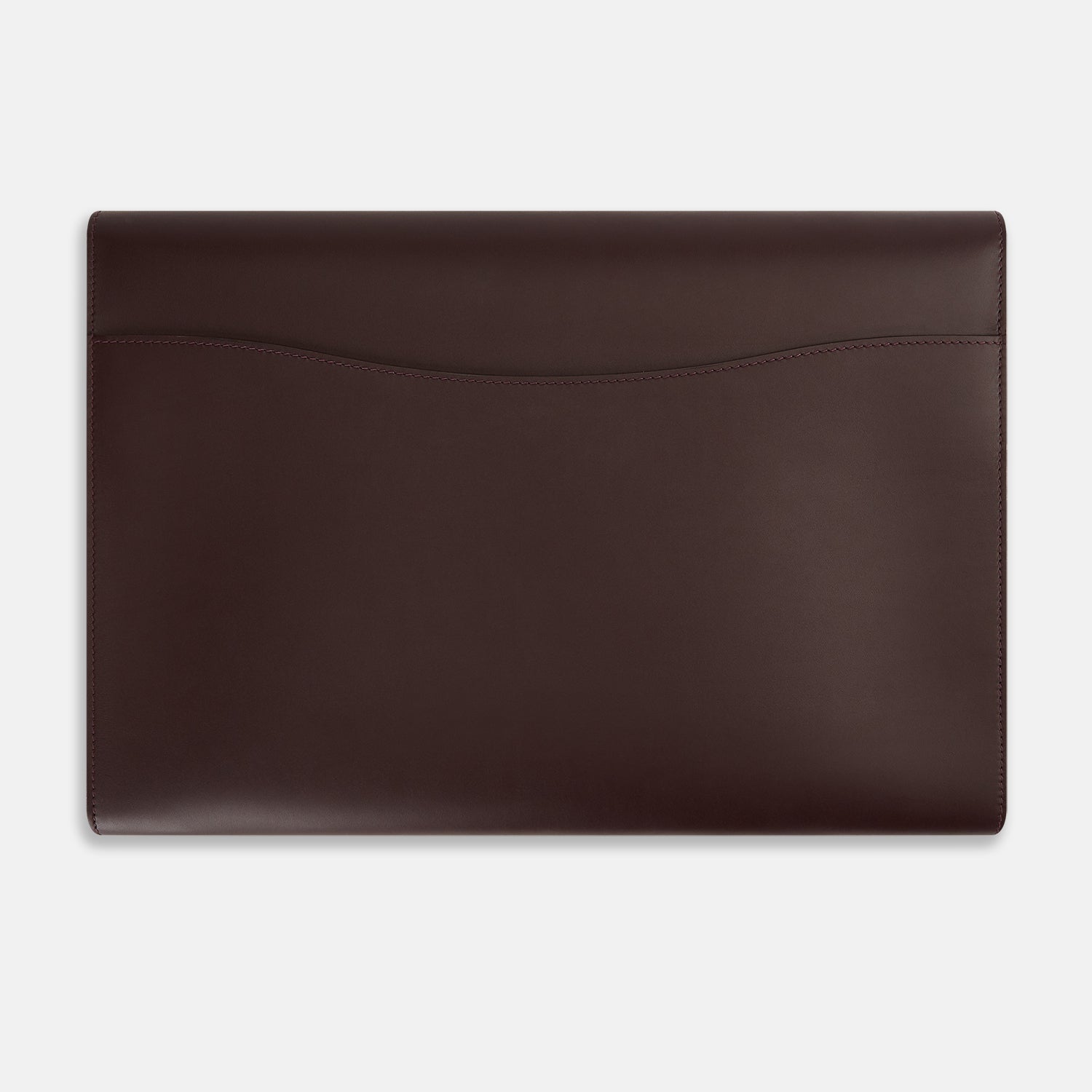 Image 4 of product The Turnbull & Asser Burgundy Leather Snap-Fasten Pouch is a sleek, envelope-style laptop accessory with a smooth finish, curved flap, and elegant snap closure, ideal for business travel against a white background.
