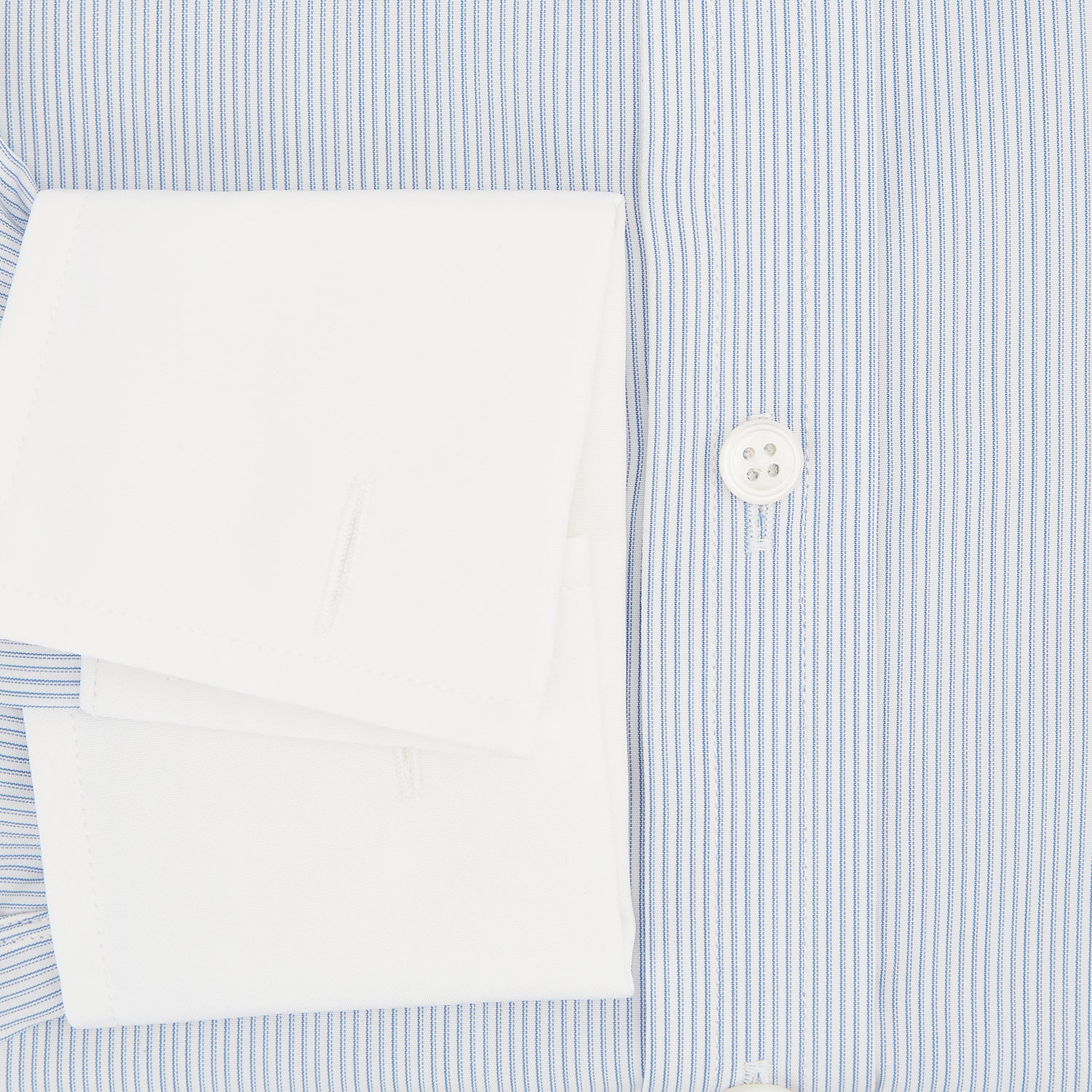 View 4 of product The Turnbull & Asser Sky Blue Hairline Multi Stripe Shirt features a contrast T&A collar and cuffs in white, Mayfair fit, and front buttons, displayed on a plain white background.