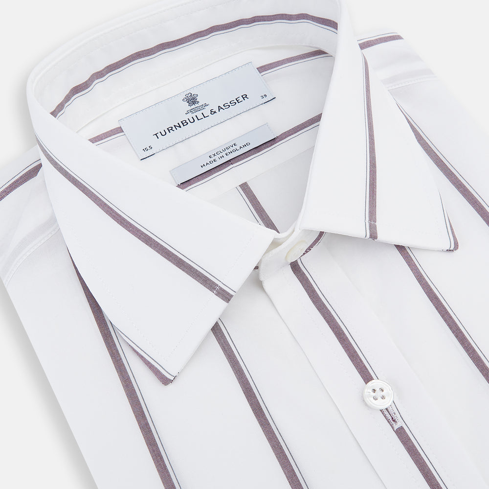 A Burgundy Track Stripe Mayfair Shirt by Turnbull & Asser, featuring long sleeves, vertical stripes, a classic collar, and crafted from premium Italian cotton, is displayed flat on a light background.