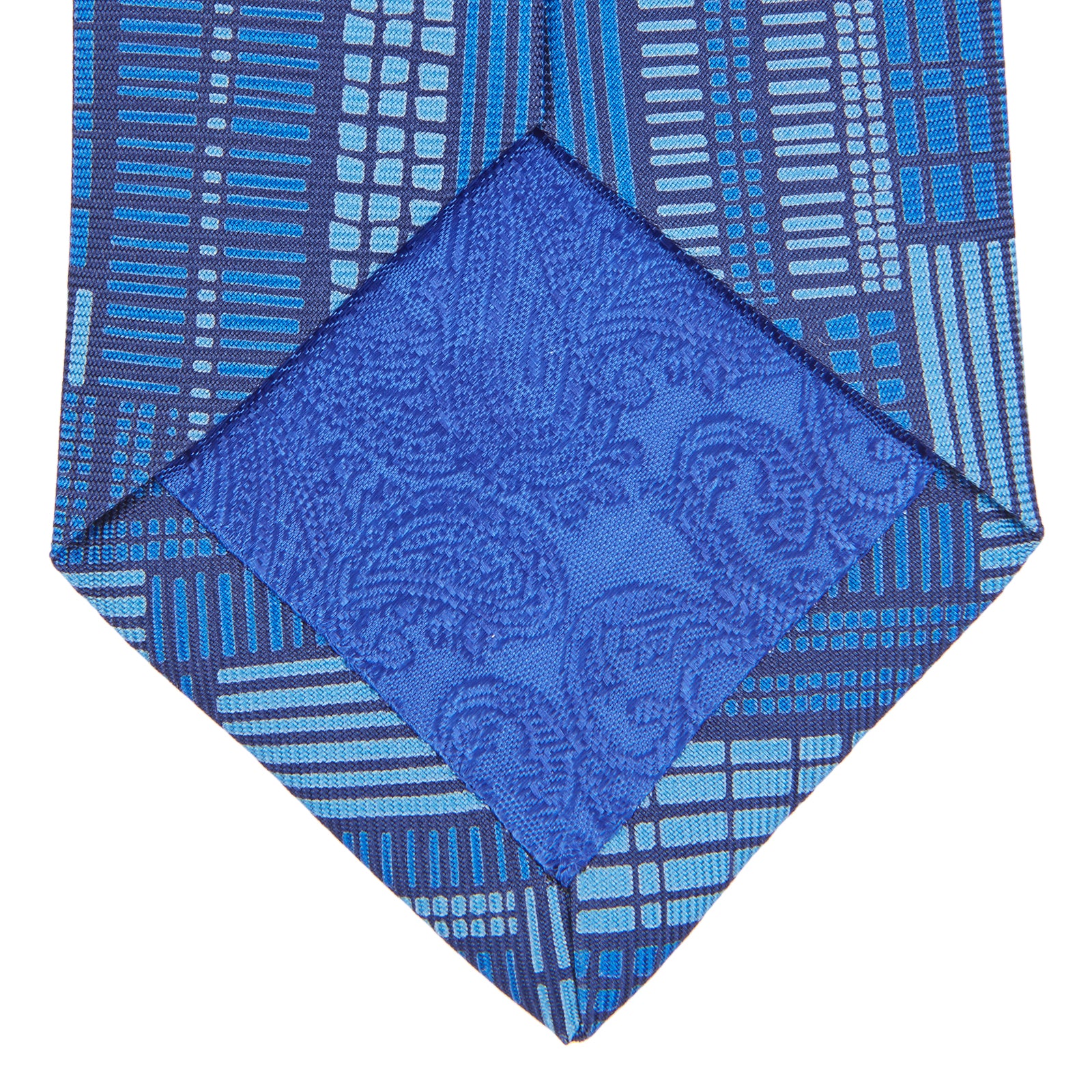 View 4 of product The Turnbull & Asser Blue Motif Printed Foulard Silk Tie showcases a geometric pattern in varying blue shades, making it a striking and essential accessory for any wardrobe.
