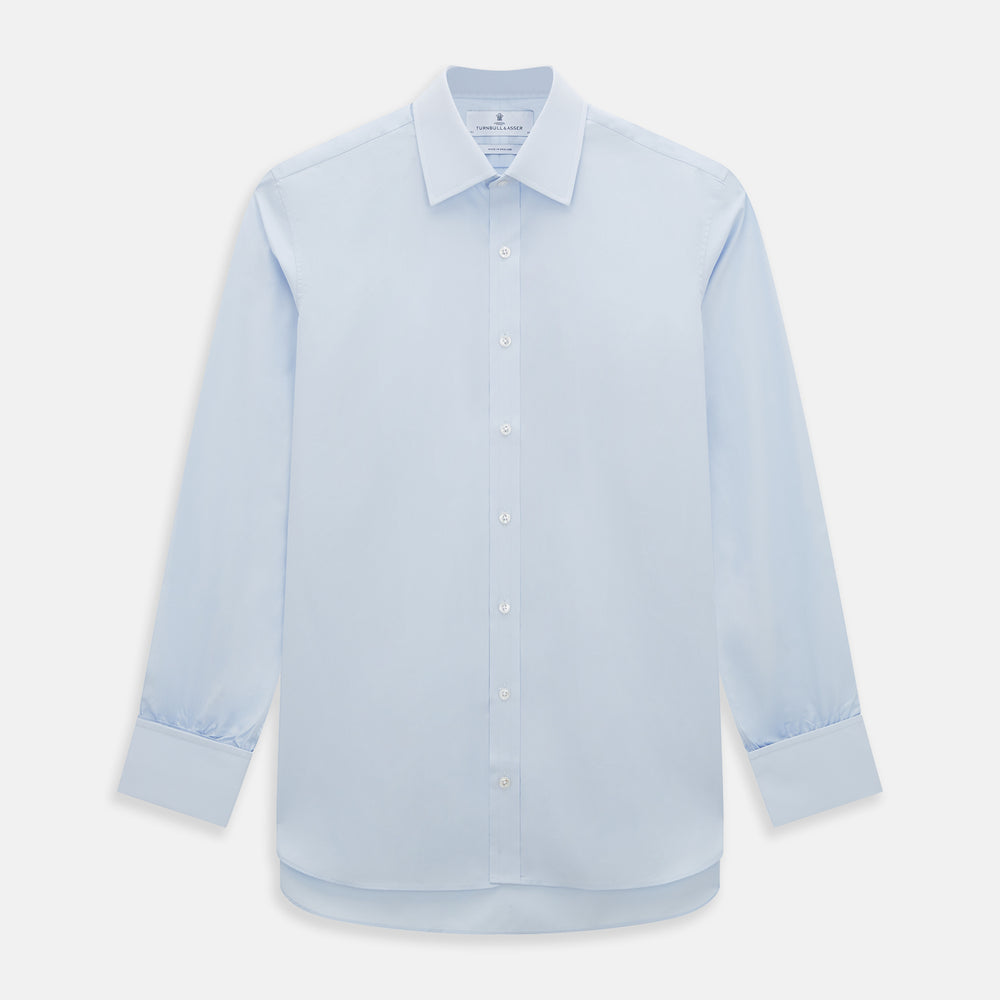 The Turnbull & Asser Light Blue Mayfair Shirt features white buttons, a classic collar, and buttoned cuffs—styled flat on a white background, it’s ideal for minimalist outfits or pairing with bold ties.