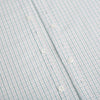 View 7 of product The Turnbull & Asser Turquoise and Red Ticking Stripe Windsor Shirt, featuring a classic collar and buttoned cuffs, is displayed flat against a white background.