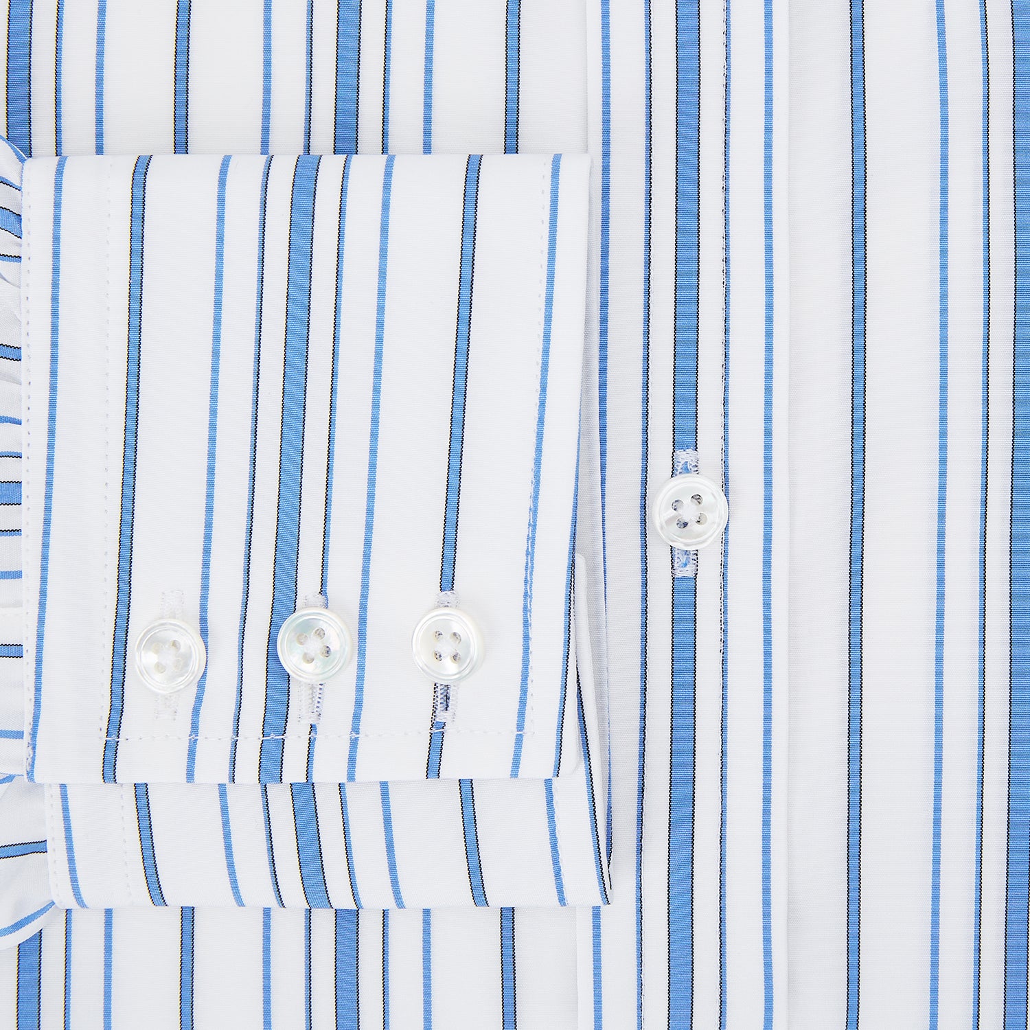 View 4 of product The Turnbull & Asser Blue Multi Stripe Mayfair Shirt features a T&A collar, vertical blue and white stripes, long sleeves, and a crisp Mayfair fit for a refined look.
