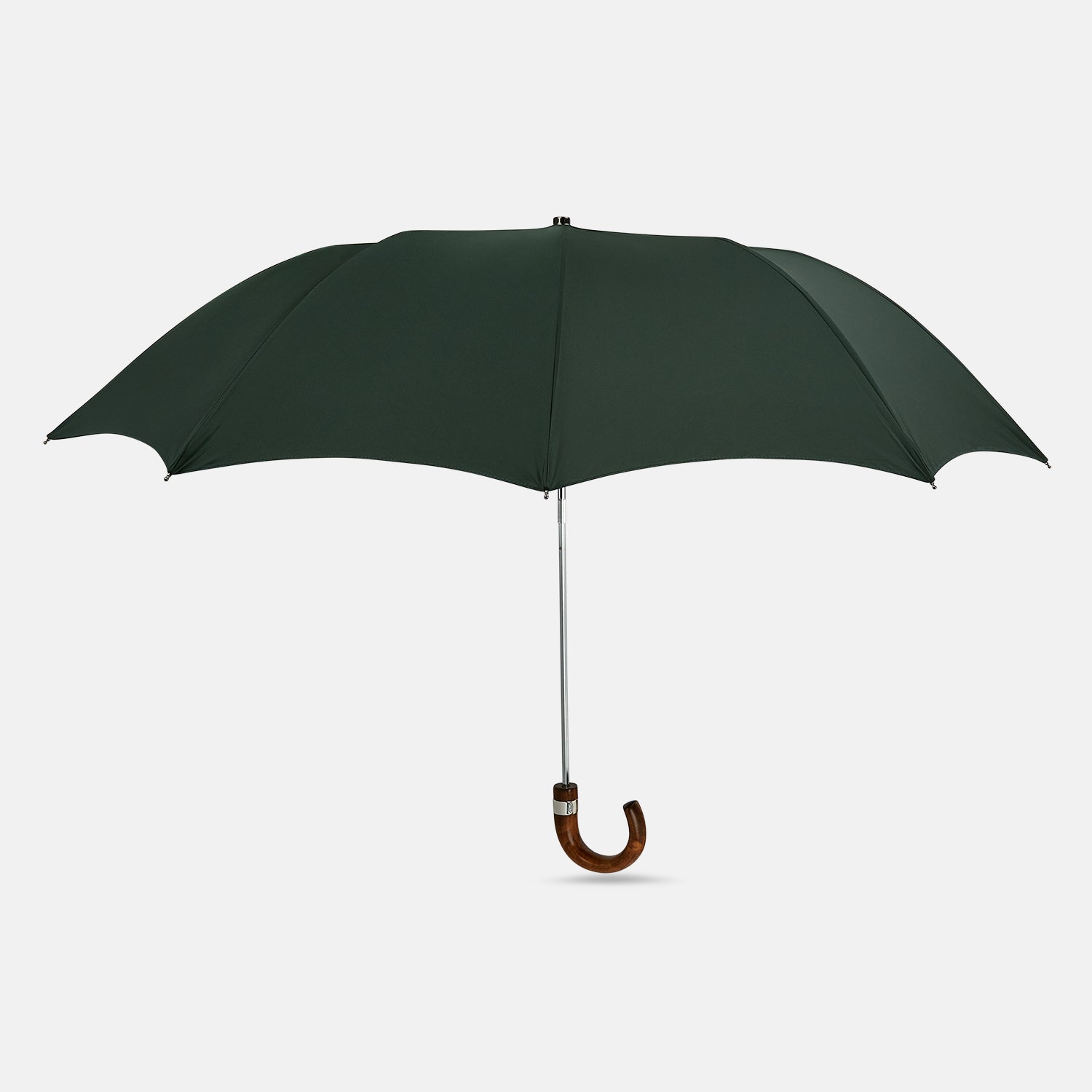 View 1 of product The Turnbull & Asser Forest Green Telescopic Umbrella features a silver shaft and a brown maple crook handle, shown fully open against a plain white background.