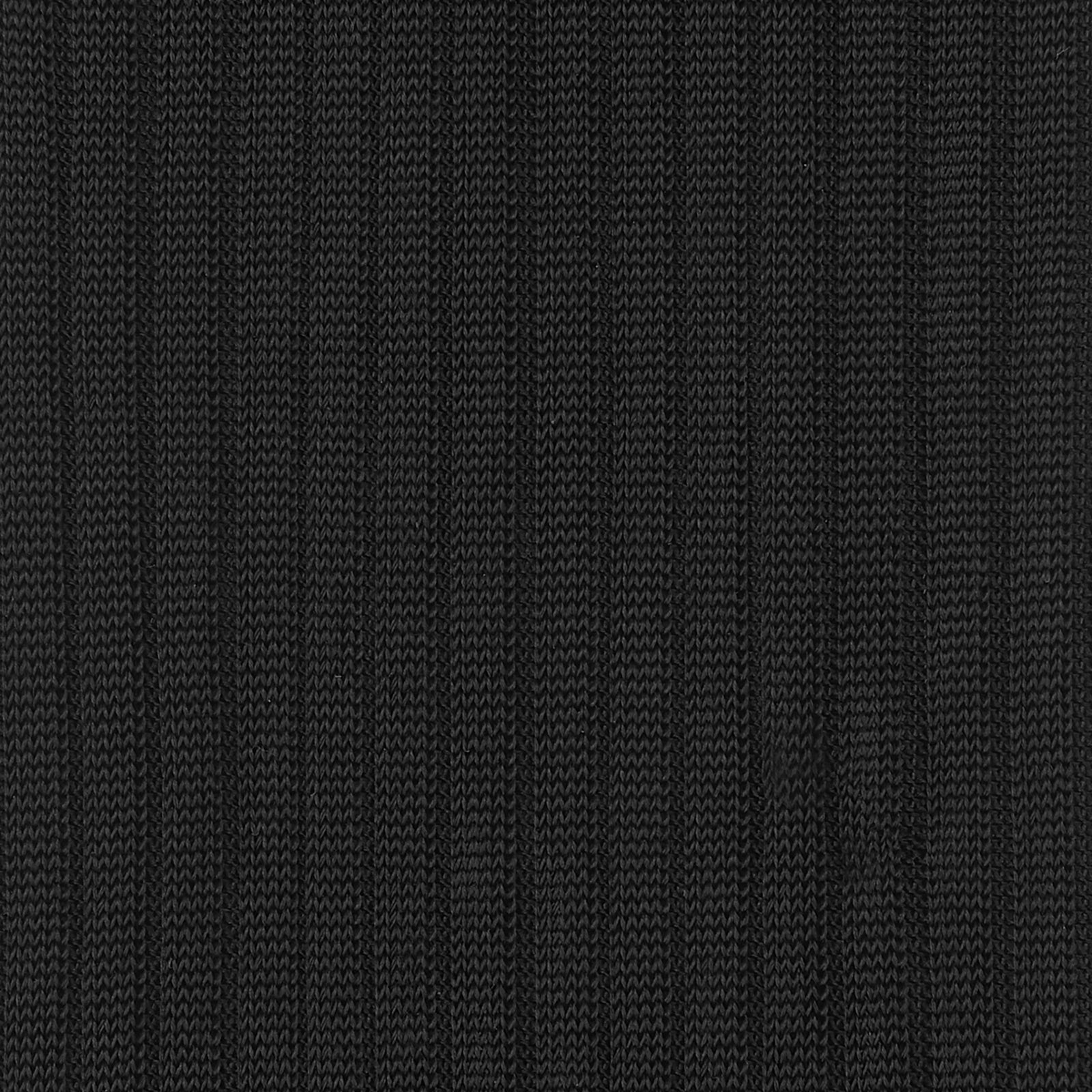 View 2 of product A single Black Long Silk Sock by Turnbull & Asser, featuring a ribbed texture, is displayed against a plain white background.