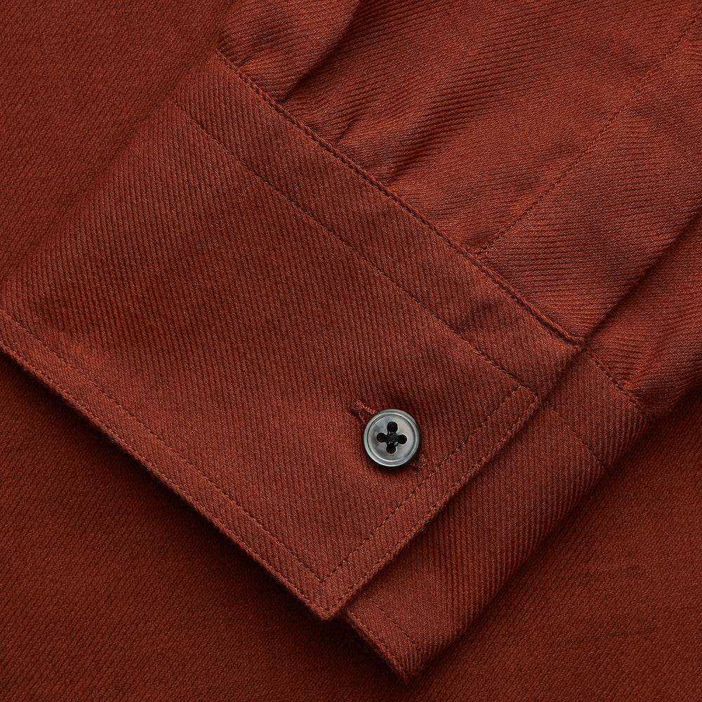 The Turnbull & Asser Burgundy Cotton and Cashmere Weekend Fit Shirt features a Dorset collar, 1-button cuffs, and a relaxed fit, shown flat against a white background.