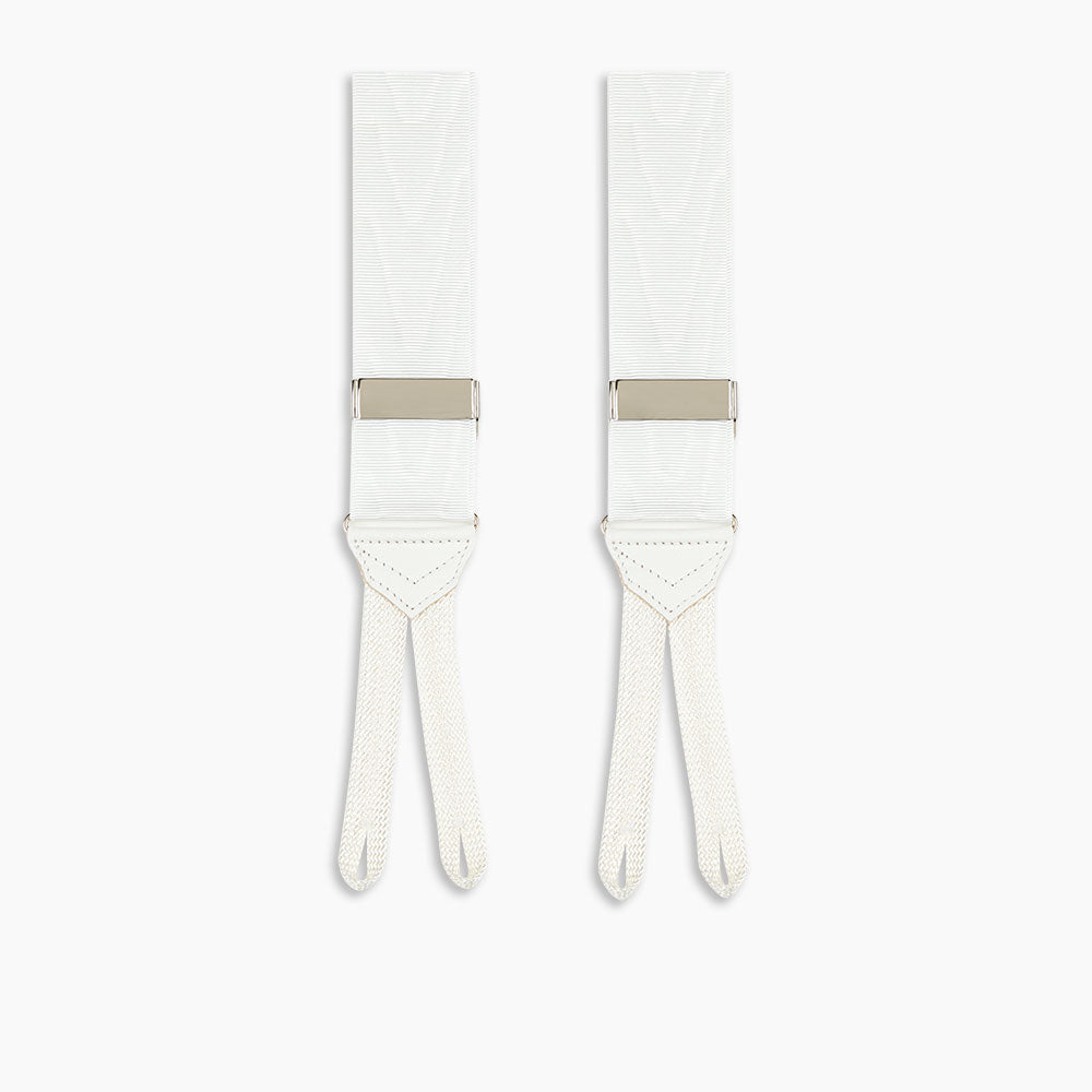 Turnbull & Asser White Adjustable Formal Braces with silver buckles and split leather ends, made in England, displayed on a light gray background.
