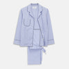 View 1 of product The Turnbull & Asser Women's Harriet Blue Bengal Stripe Pyjama Set features premium cotton, a long-sleeve button-up top with chest pocket, and drawstring pants—an ideal gift option.