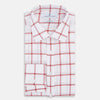 View 5 of product The Turnbull & Asser Dark Red Grid Check Mayfair Shirt is a long-sleeve white shirt made from Italian cotton, featuring a bold dark red grid pattern, button-down front, and classic collar, shown laid flat on a white background.